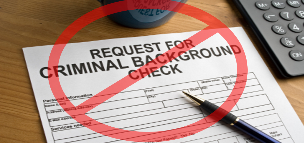 A photo of a request for criminal background check with a "no" sign over it